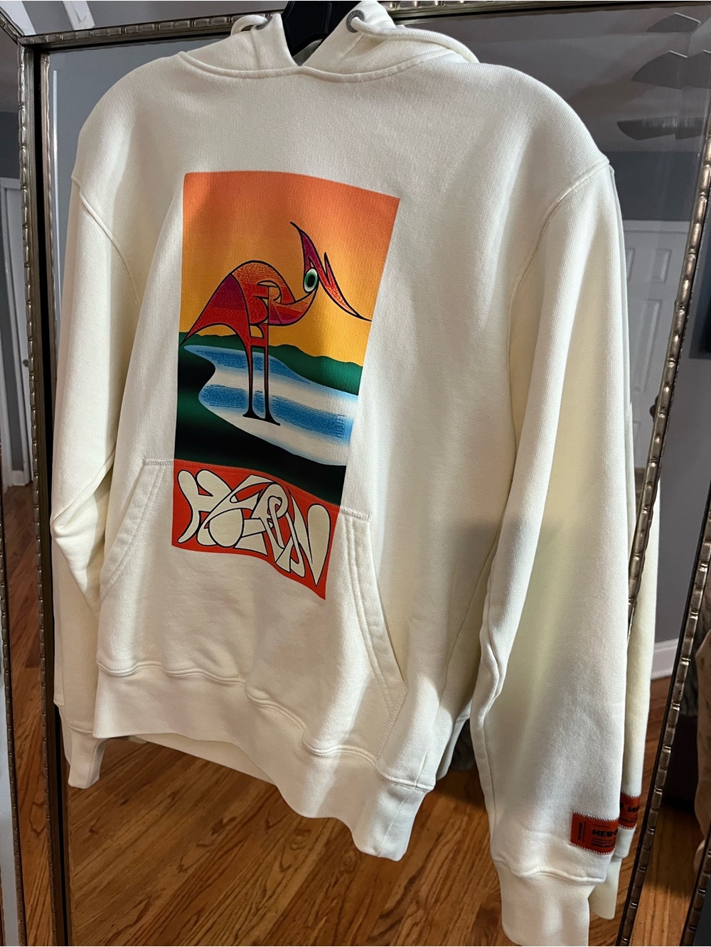 Heron Preston Ivory Hoodie with Multicolor Bird Graphic and Heron Logo